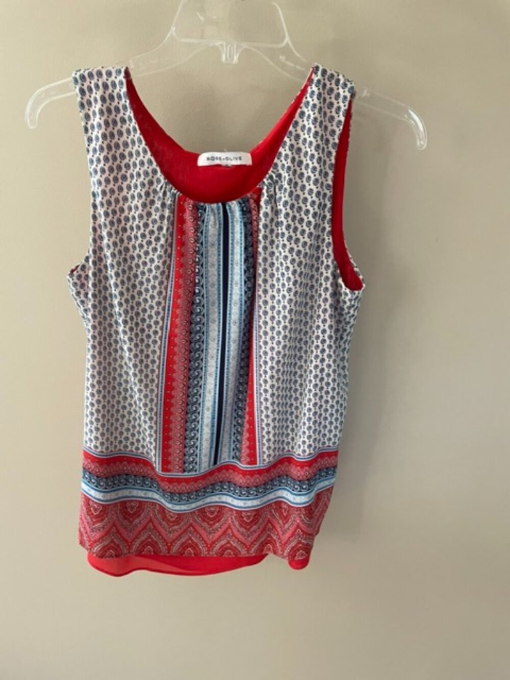 Women's Sleeveless Multicolor blouse in size small.